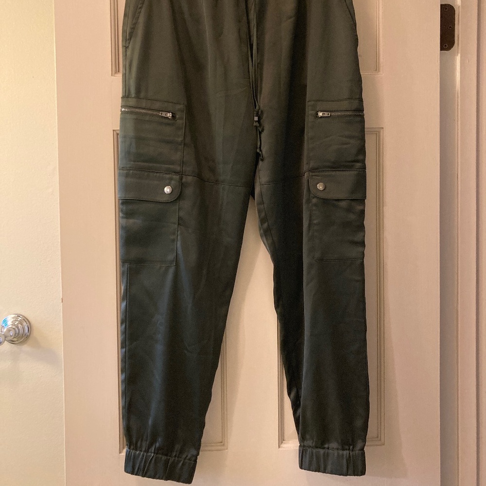 Shiny green cargo joggers